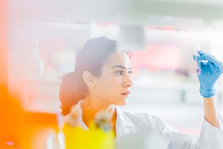 scientist with a sample